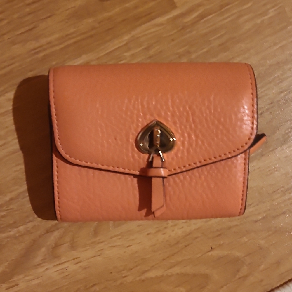 Kate Spade Orange Wallet with Textured Leather and Minimalist Design